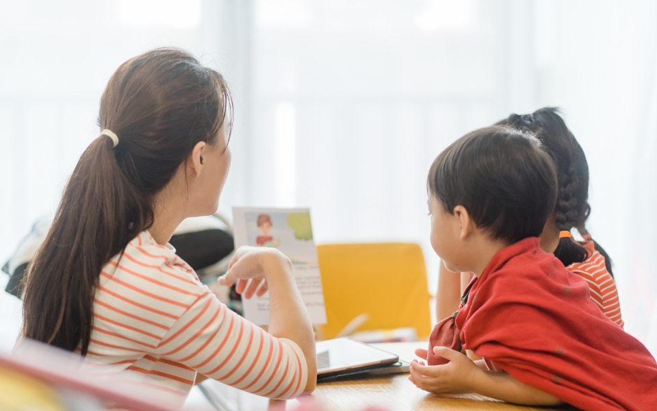 Adult and children in children’s Church